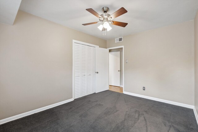 5305 Brantford Ave, Memphis, TN 38120 - unfurnished bedroom with baseboards, carpet, a closet, and ceiling fan