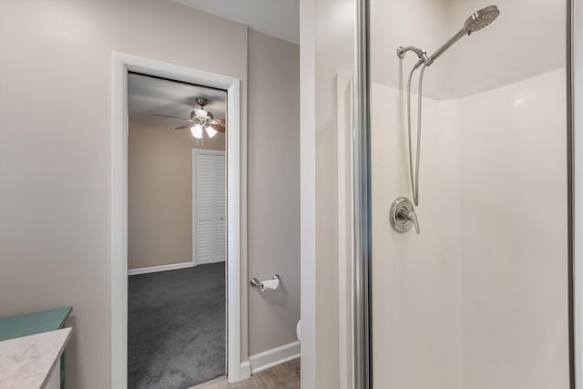 5305 Brantford Ave, Memphis, TN 38120 - full bathroom with a shower, ceiling fan, baseboards, vanity, and toilet