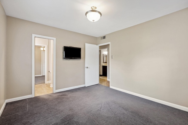 5305 Brantford Ave, Memphis, TN 38120 - unfurnished bedroom featuring carpet floors and baseboards