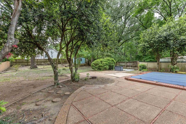 5305 Brantford Ave, Memphis, TN 38120 - view of patio featuring a fenced backyard and an outdoor structure