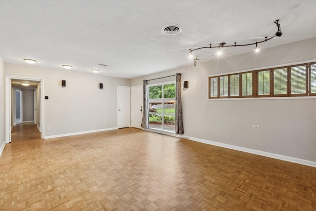 5305 Brantford Ave, Memphis, TN 38120 - unfurnished room with baseboards and a textured ceiling