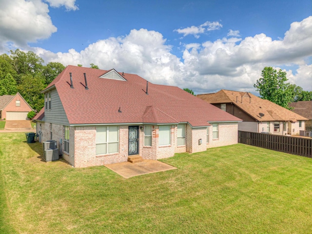 rear view of house with brick siding, central AC, a patio, and entry steps