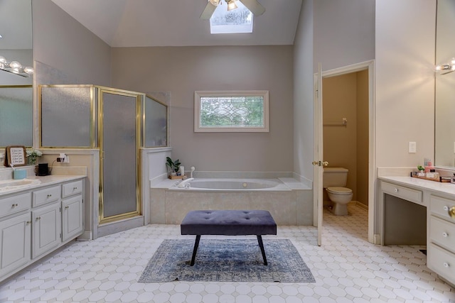 1917 Steeplebrook Cv, Cordova, TN 38016 - full bathroom with a skylight, vanity, a shower stall, and a bath