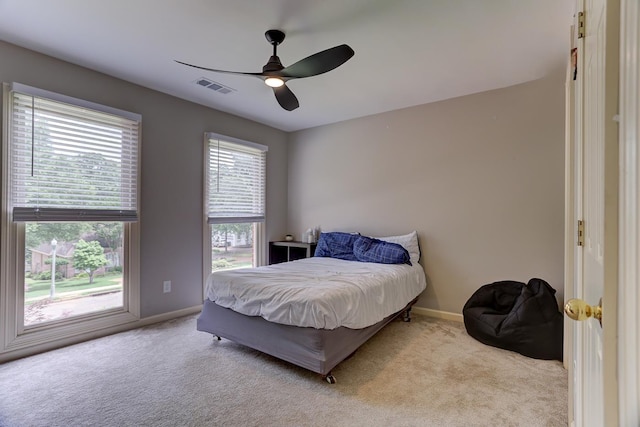 1917 Steeplebrook Cv, Cordova, TN 38016 - carpeted bedroom with baseboards and a ceiling fan
