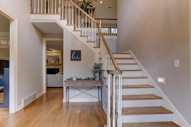 1917 Steeplebrook Cv, Cordova, TN 38016 - stairway with wood finished floors and baseboards