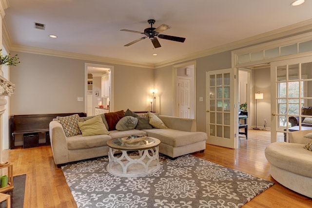 1917 Steeplebrook Cv, Cordova, TN 38016 - living room with a ceiling fan, wood finished floors, crown molding, and recessed lighting