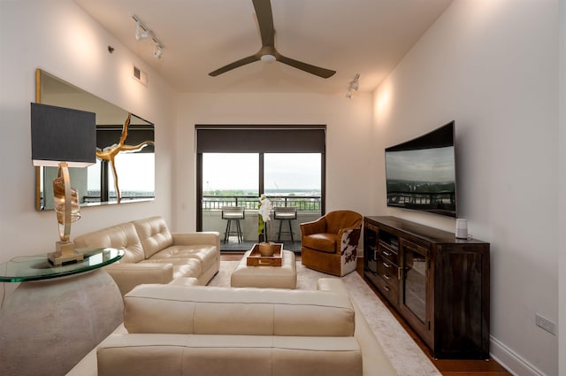 717 S Riverside Dr Unit 1203, Memphis, TN 38103 - living room with rail lighting and ceiling fan