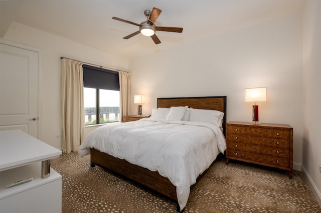 717 S Riverside Dr Unit 1203, Memphis, TN 38103 - bedroom with baseboards, carpet, and ceiling fan