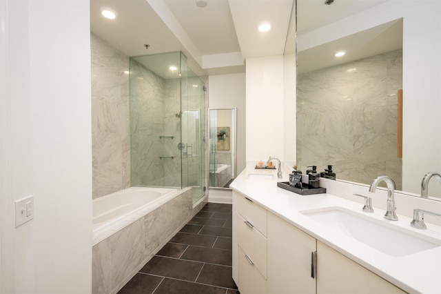 717 S Riverside Dr Unit 1203, Memphis, TN 38103 - bathroom featuring a stall shower, recessed lighting, a bath, tile patterned floors, and vanity