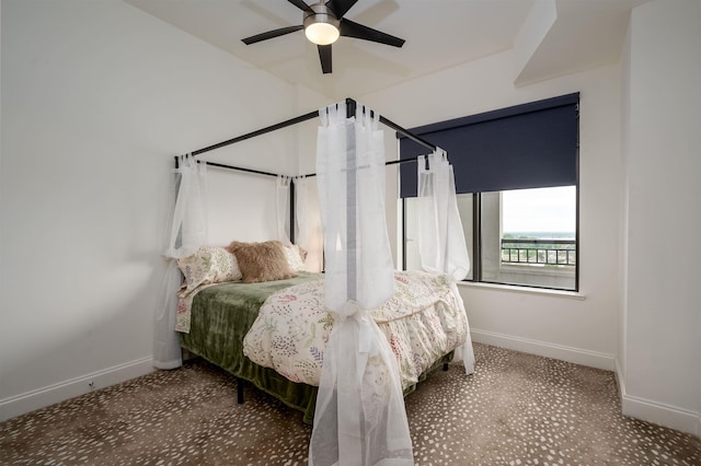 717 S Riverside Dr Unit 1203, Memphis, TN 38103 - carpeted bedroom featuring baseboards and a ceiling fan