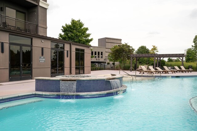 717 S Riverside Dr Unit 1203, Memphis, TN 38103 - community pool with a pergola and a patio area