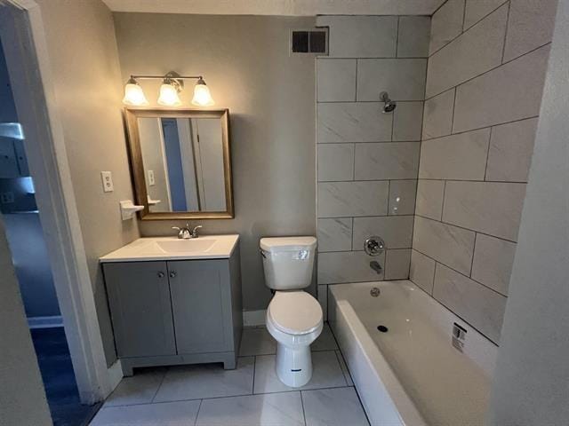 2151 Ptarmigan Trl, Memphis, TN 38134 - full bathroom with vanity, tile patterned flooring, toilet, shower / tub combination, and baseboards
