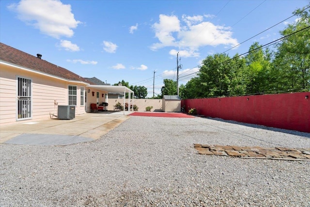 2518 Bassfield Dr, Memphis, TN 38133 - fenced yard featuring a patio and central AC unit