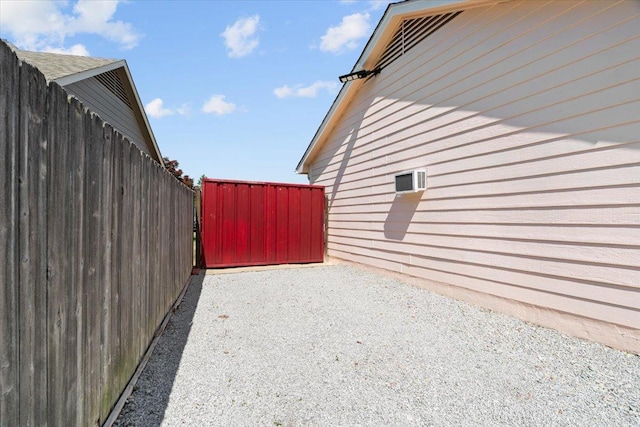 2518 Bassfield Dr, Memphis, TN 38133 - view of side of home featuring a patio and fence