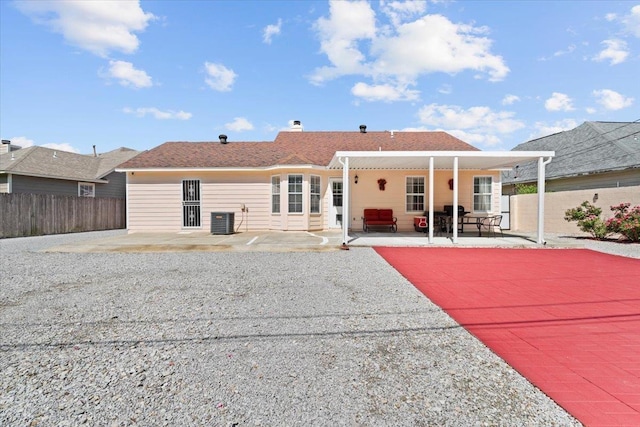 2518 Bassfield Dr, Memphis, TN 38133 - back of property featuring a patio area, central air condition unit, and fence