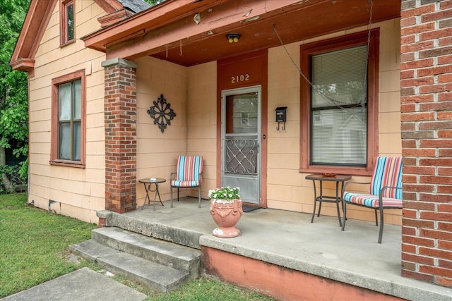 2102 Carr Ave, Memphis, TN 38104 - property entrance with brick siding and a porch