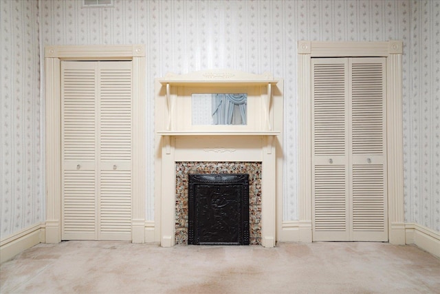 2102 Carr Ave, Memphis, TN 38104 - unfurnished living room featuring carpet floors and a fireplace with flush hearth