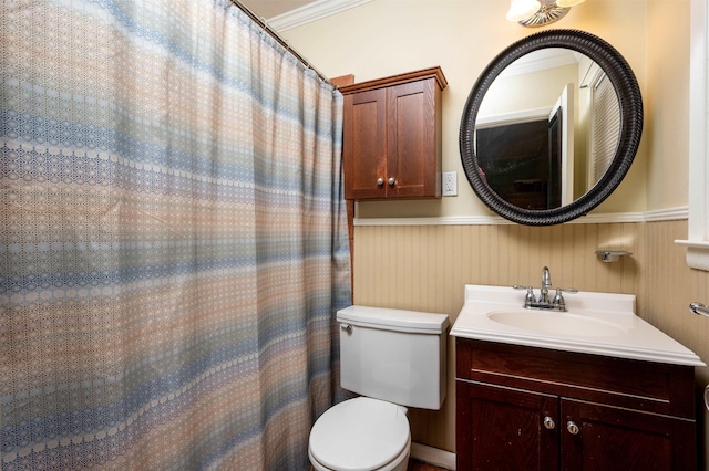 4152 Barfield Rd, Memphis, TN 38117 - bathroom with a wainscoted wall, toilet, and vanity