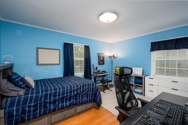 4152 Barfield Rd, Memphis, TN 38117 - bedroom featuring crown molding and light wood-type flooring