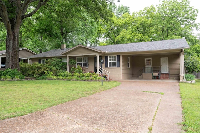 4152 Barfield Rd, Memphis, TN 38117 - ranch-style house with concrete driveway, a front lawn, a carport, and a chimney