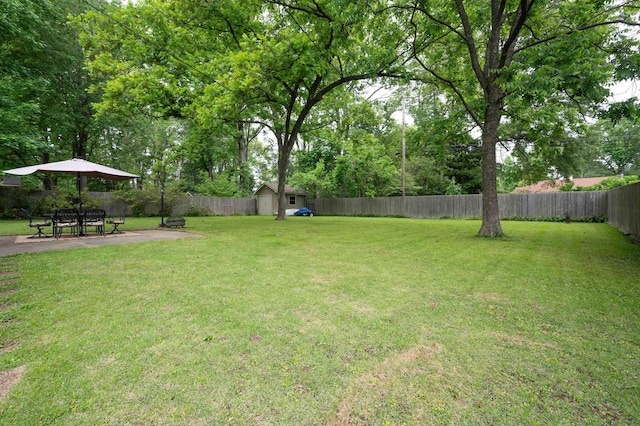 4152 Barfield Rd, Memphis, TN 38117 - view of yard featuring a storage shed, an outdoor structure, and a patio area