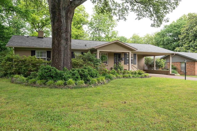 4152 Barfield Rd, Memphis, TN 38117 - ranch-style home with a chimney, a front lawn, an attached carport, driveway, and brick siding
