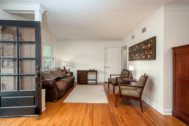 4152 Barfield Rd, Memphis, TN 38117 - living area featuring wood finished floors, ornamental molding, and baseboards