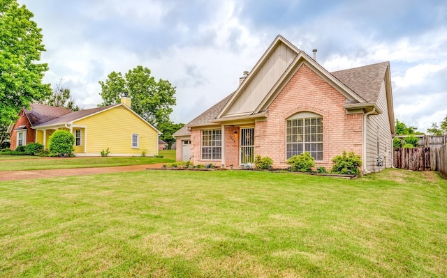 6686 Elmore Ridge Ln, Memphis, TN 38134 - single story home with brick siding and a shingled roof