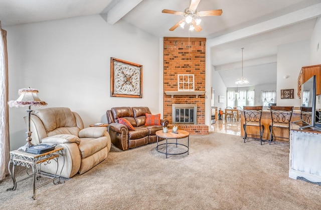 6686 Elmore Ridge Ln, Memphis, TN 38134 - carpeted living room with ceiling fan, a brick fireplace, and a chandelier