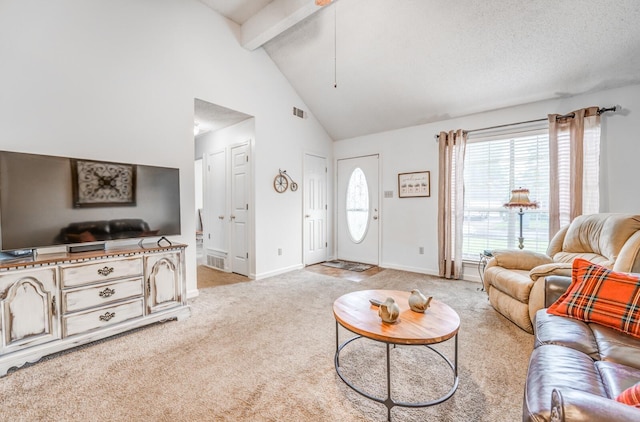6686 Elmore Ridge Ln, Memphis, TN 38134 - living area featuring beamed ceiling, baseboards, high vaulted ceiling, and light carpet