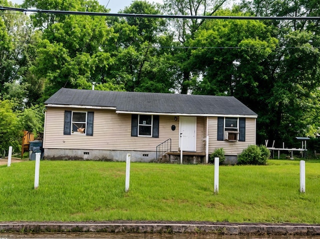 view of front of home featuring crawl space, a front lawn, and cooling unit