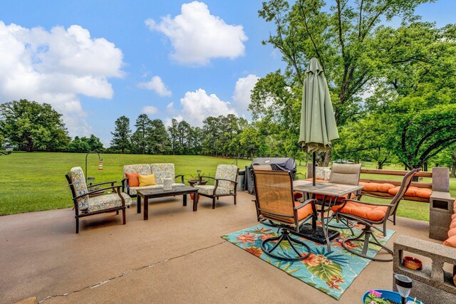 6331 Twin Oaks Dr, Millington, TN 38053 - view of patio with outdoor lounge area, view of wooded area, outdoor dining area, and grilling area