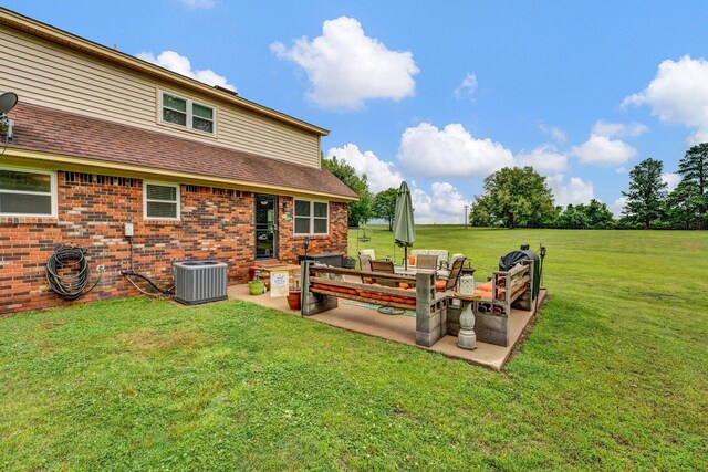 6331 Twin Oaks Dr, Millington, TN 38053 - view of grassy yard with central air condition unit and a patio area