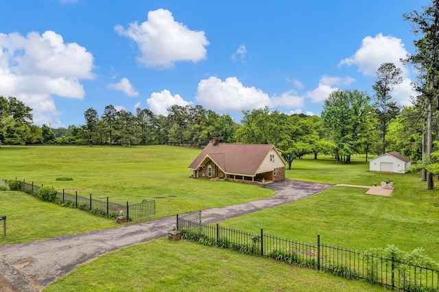 6331 Twin Oaks Dr, Millington, TN 38053 - view of yard with asphalt driveway and a rural view