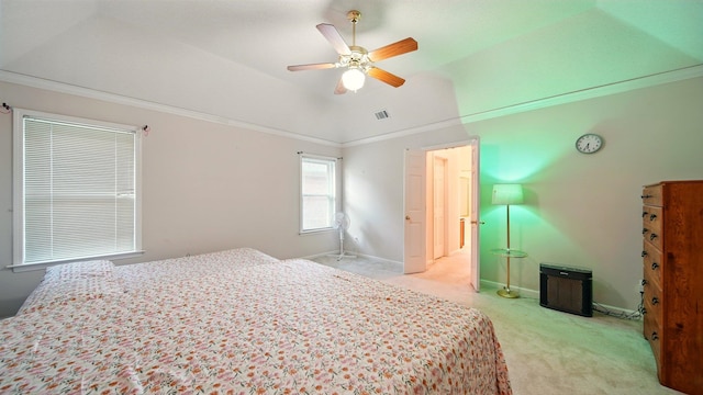 unfurnished bedroom featuring light colored carpet, ornamental molding, baseboards, a ceiling fan, and lofted ceiling