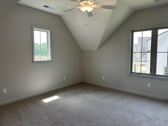 bonus room with carpet flooring, ceiling fan, vaulted ceiling, and baseboards