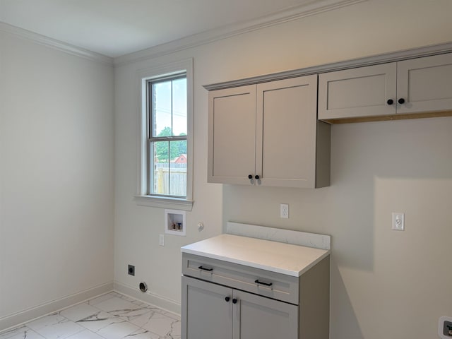 clothes washing area with cabinet space, hookup for an electric dryer, washer hookup, baseboards, and light marble finish flooring