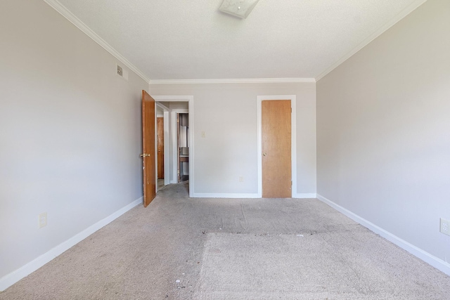 3229 Thirteen Colony Mall Unit 5B, Memphis, TN 38115 - unfurnished bedroom featuring crown molding, carpet floors, and baseboards