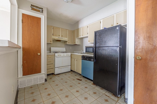 3229 Thirteen Colony Mall Unit 5B, Memphis, TN 38115 - kitchen with dishwashing machine, freestanding refrigerator, gas range gas stove, under cabinet range hood, and cream cabinetry
