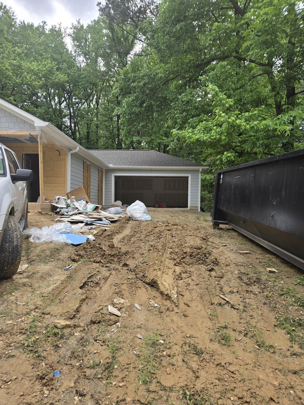 3299 University St, Memphis, TN 38127 - view of home's exterior with a detached garage