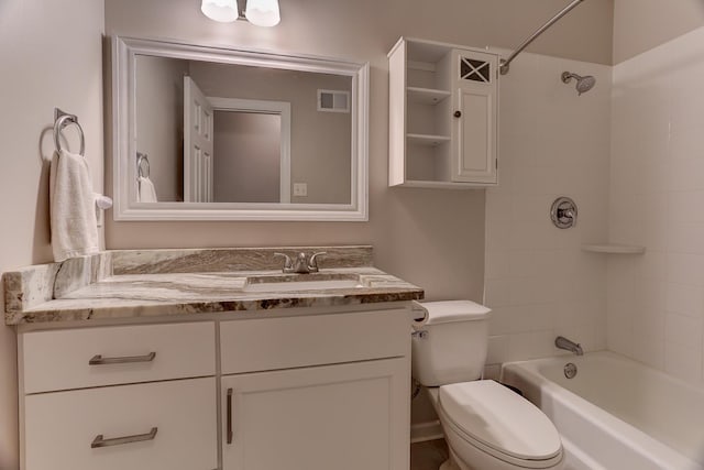 full bath with toilet, vanity, and shower / bathtub combination