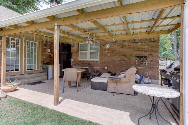 view of patio / terrace with french doors and ceiling fan