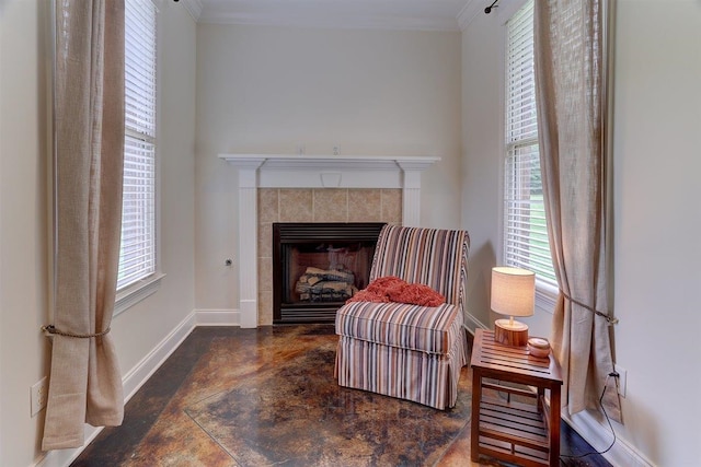 100 Whitehall Ct, Unicorp/Eads, TN 38028 - sitting room featuring a tiled fireplace, ornamental molding, and baseboards