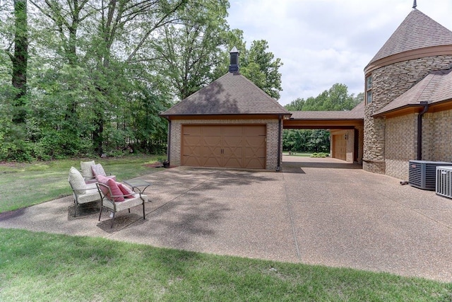 100 Whitehall Ct, Unicorp/Eads, TN 38028 - garage featuring driveway and central AC