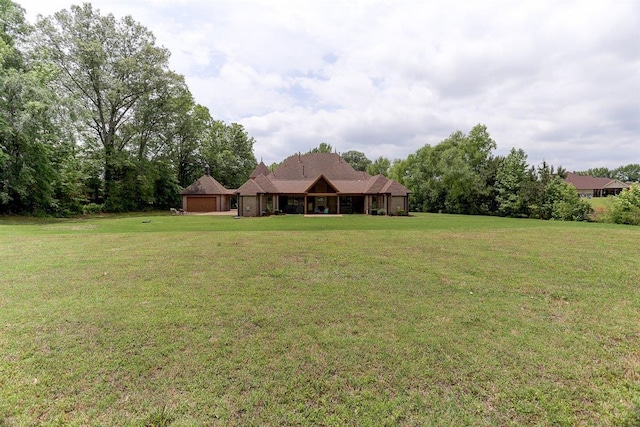 100 Whitehall Ct, Unicorp/Eads, TN 38028 - view of green lawn with a garage