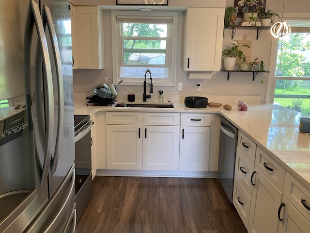 6288 Martinwest Dr, Millington, TN 38053 - kitchen with appliances with stainless steel finishes, a sink, open shelves, white cabinets, and light countertops