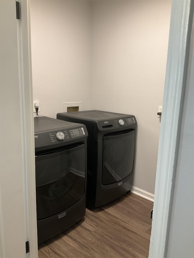6288 Martinwest Dr, Millington, TN 38053 - laundry area featuring independent washer and dryer, wood finished floors, and baseboards