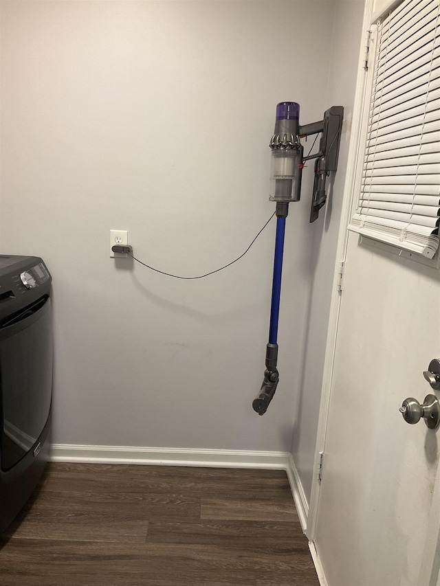 6288 Martinwest Dr, Millington, TN 38053 - clothes washing area featuring washer / dryer, dark wood-style flooring, and baseboards
