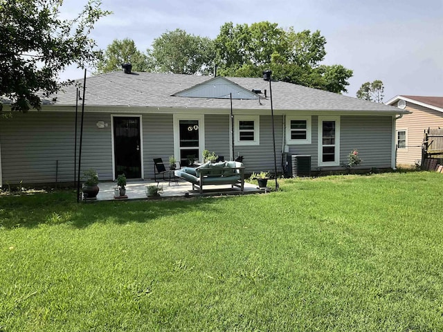 6288 Martinwest Dr, Millington, TN 38053 - back of house featuring a patio area, outdoor lounge area, a lawn, and a shingled roof