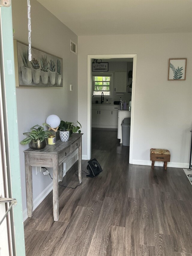 6288 Martinwest Dr, Millington, TN 38053 - hall with a sink, dark wood-style flooring, and baseboards
